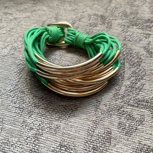 Gold and green bangle bracelet